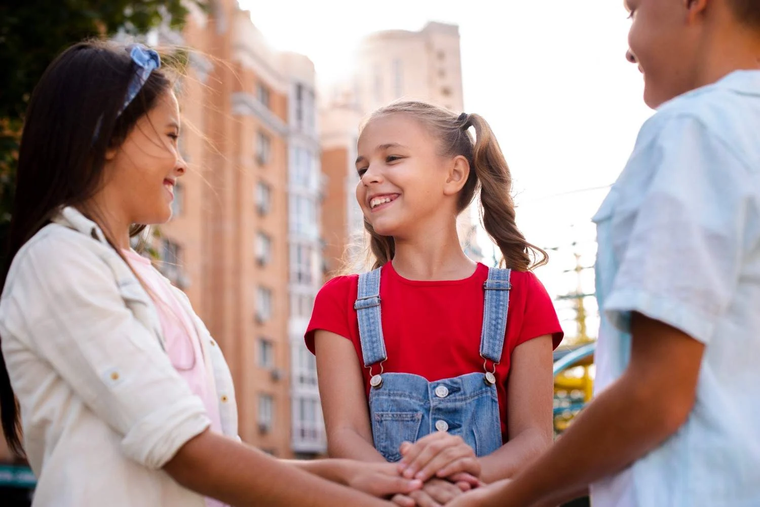 Parents and child sharing a happy moment after reaching a family law agreement.